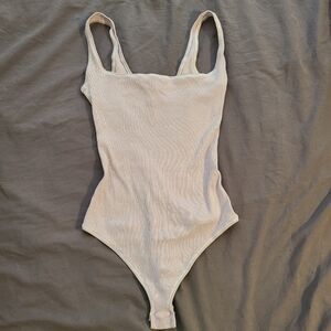 SKIMS Ribbed Thong Body Suit in Lilac size S